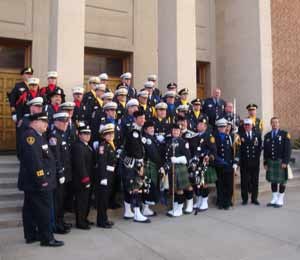 Photo Jules ScaddenThe EMS National Memorial Service Honor Guard and Bag Pipers stand in front of the First Presbyterian Church in Colorado Springs.