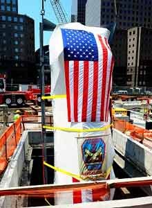 Photo FDNYLadder 3's apparatus is lowered into the 9/11 Memorial Museum by a crane.