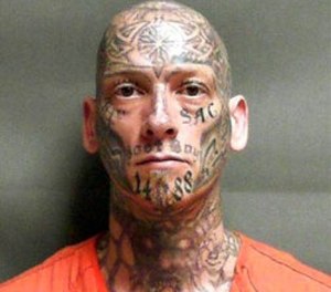 This pair of undated identification photos released by the U.S. Marshal's Office shows Eric Judkins, an inmate at a halfway house in Manchester, N.H., who failed to return to the facility Monday night, Aug. 28, 2017.