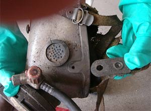 NIOSH photoOne of the face pieces is seen missing a harness fastener.