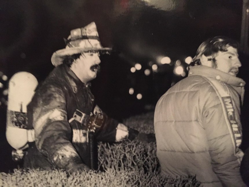 Chief Billy Goldfeder fights an apartment fire in 1979