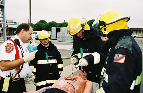 In his model, in the event of an MCI, the company officer will establish command.