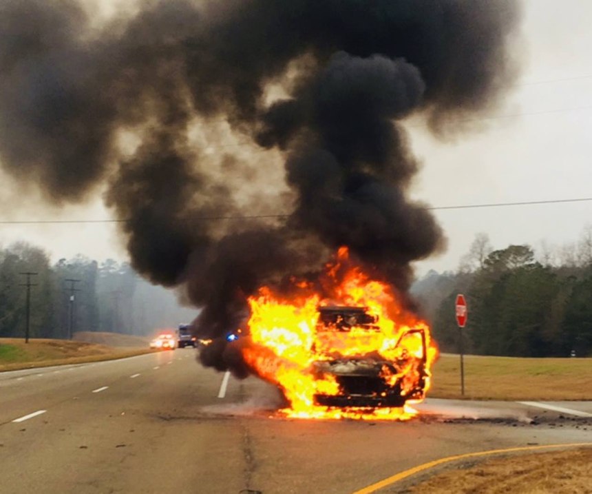 An ambulance erupted into flames on a highway after a mechanical failure, according to officials. (Photo/Jones County Fire Council)