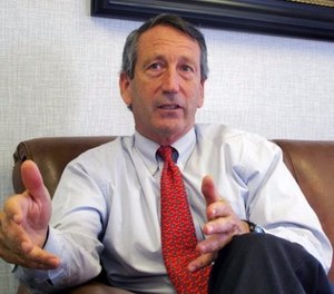 In this Dec. 18, 2013, file photo, U.S. Rep. Mark Sanford, R-S.C., discusses his first months back in Congress during an interview in Mount Pleasant, S.C.