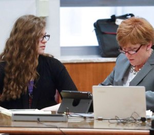 Anissa Weier, left, talks to her attorney Maura McMahon during jury selection in the trial to determine 15-year-old Weier's competency at Waukesha County Courthouse Monday, Sept 11, 2017, in Waukesha, Wis. (AP Photo/Morry Gash, Pool)