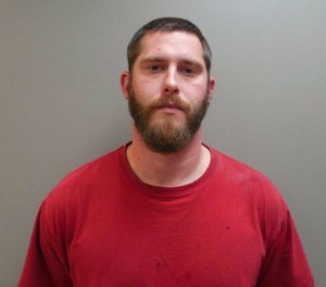 This undated image provide by the Paulding County Sheriff’s Office shows Branden Powell. Authorities say a manhunt is under way for Powell, an Ohio rape suspect who overpowered a sheriff’s deputy in a transport van and stole his gun and ammunition.