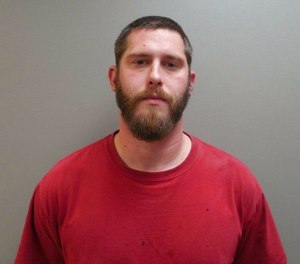 This undated image provide by the Paulding County Sheriff’s Office shows Branden Powell. Authorities say a manhunt is under way for Powell, an Ohio rape suspect who overpowered a sheriff’s deputy in a transport van and stole his gun and ammunition. (Paulding County Sheriff’s Office via AP)