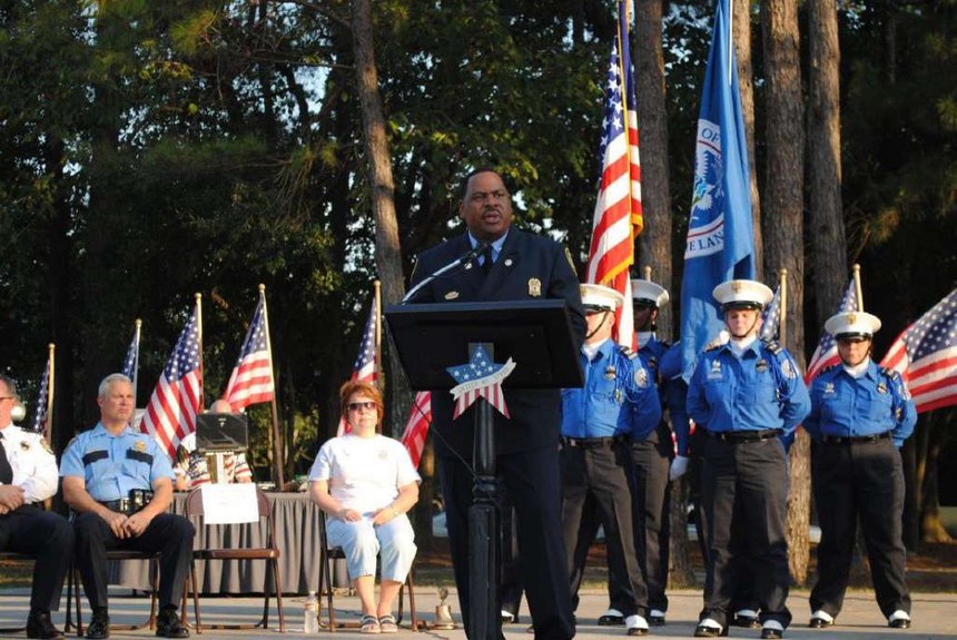 Blackmon delivering a speech at the 9/11 Rememberance Ceremony.