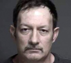 This undated photo provided by the Warren County Sheriff's Office shows Ray Adams. Warren County Prosecutor David Fornshell says Adams, a milk delivery man, snuck marijuana, tobacco and cellphones into an Ohio prison hidden in milk cartons. (Warren County Sheriff's Office via AP)