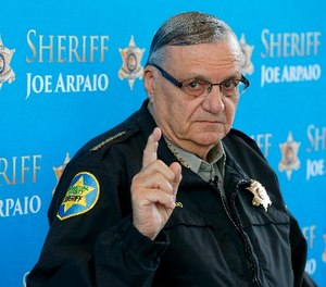 In this Dec. 18, 2013 file photo, Maricopa County Sheriff Joe Arpaio pauses as he answers a question during a news conference at Maricopa County Sheriff's Office Headquarters in Phoenix.