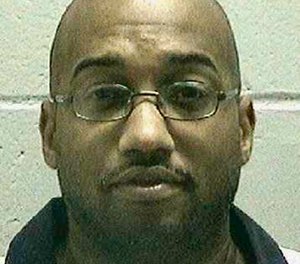 This undated image provided by the Georgia Department of Corrections shows death-row inmate Robert Earl Butts Jr., who is convicted of robbing and killing an off-duty CO.