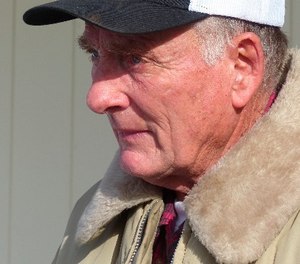 In this Jan. 2, 2016, file photo, rancher Dwight Hammond Jr. greets protesters outside his home in Burns, Ore.
