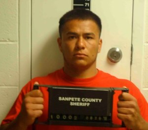 This photo provided by the Sanpete County Jail in Manti, Utah, shows Ruben Hernandez. Prosecutors say Hernandez, an Idaho prison inmate sent to help fight a wildfire, raped a woman who was also working to support firefighters in Utah. Sanpete County Attorney Kevin Daniels said Tuesday, Sept. 4, 2018, the woman had rejected several advances from Hernandez before the Aug. 29 assault. Hernandez was charged with felony rape.