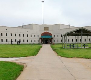 In this May 19, 2015 file photo, a housing unit is seen on the grounds of the Tecumseh State Correctional Institution during a media tour of the facility, in Tecumseh, Neb. (AP Photo/Nati Harnik, File)