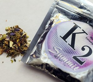 This Feb. 15, 2010, file photo shows a package of K2, a concoction of dried herbs sprayed with chemicals.