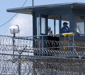 In this photo taken May 13, 2011, a guard is shown in a tower at the Arkansas Department of Correction Tucker Unit near Tucker, Ark. (AP Photo/Danny Johnston)
