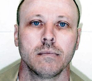 This undated file photo released by the Nebraska Dept. of Corrections shows Carey Dean Moore. (Department of Corrections/The Lincoln Journal Star via AP, File)