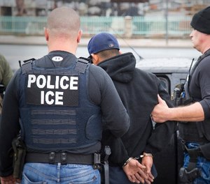 In this Tuesday, Feb. 7, 2017, photo released by U.S. Immigration and Customs Enforcement shows foreign nationals being arrested. (Charles Reed/U.S. Immigration and Customs Enforcement via AP)