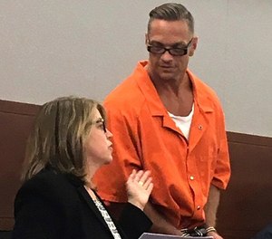 In this Aug. 17, 2017 file photo, Nevada death row inmate Scott Raymond Dozier confers with Lori Teicher, a federal public defender involved in his case, during an appearance in Clark County District Court in Las Vegas.