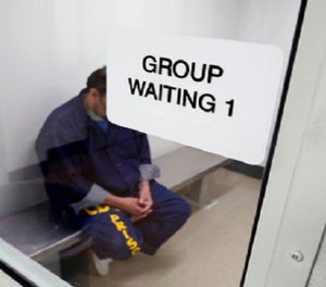 An inmate waits for his appointment in a holding room at a mental health treatment unit at the California Medical Facility in Vacaville, Calif. Gov. (AP Photo/Rich Pedroncelli, File)