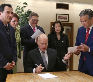 Gov. Jerry Brown signed a bill to end bail on Aug. 28.