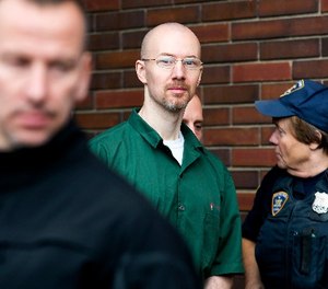 David Sweat is lead out of the Clinton County Government Center under heavy guard following his court appearance in which he pleaded guilty to one count of promoting prison contraband and two counts of escape in the first degree in Plattsburgh, N.Y. Friday, Nov. 13, 2015. (Gabe Dickens/Press-Republican via AP, Pool)