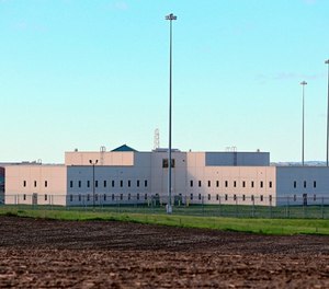 In this May 11, 2015 file photo, a housing unit is seen at sun rise at the Tecumseh State Correctional Institution in Tecumseh, Neb., Monday, May 11, 2015. (AP Photo/Nati Harnik, file)