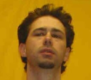 The State Highway Patrol report released this month says the hole wasn't discovered until inmate Casey Pigge used a cinder block from the wall to kill his cellmate.