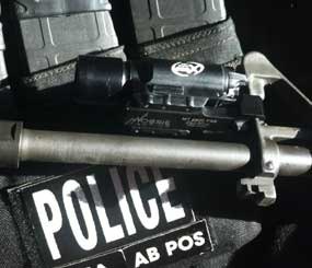 The Mossie Midnight Mount made by Battle Comp Enterprises attaches with two 8/32 x 1/4 self-locking set screws, one on the top of the mount and the other on the bottom, that securely hold the mount to the front sight base.