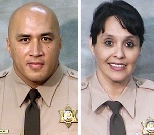 These undated photos provided by the Fresno County Sheriff's Office show Officers Toamalama Scanlan, left, and Juanita Davila.