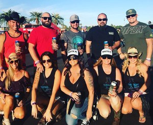 The group of 10 friends traveled to Las Vegas for the Route 91 Harvest festival. Chris and his wife, Amber, are pictured in the middle. Hannah Ahler is front row, second from the left.