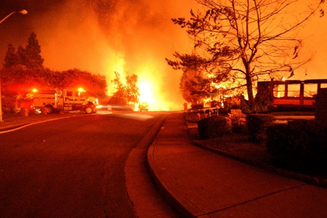 Firefighters searched for victims to evacuate in the face of escalating conditions. (Photo/Courtesy of Mike Daly)