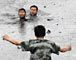 Chinese firefighters in oil spill