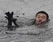 Chinese firefighters in oil spill