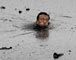 Chinese firefighters in oil spill