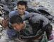 Chinese firefighters in oil spill