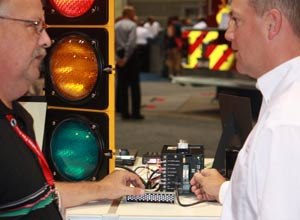 Photo Jamie ThompsonChief Shawn Murray discusses new technology with Rick Sachse at Fire-Rescue International in Chicago.