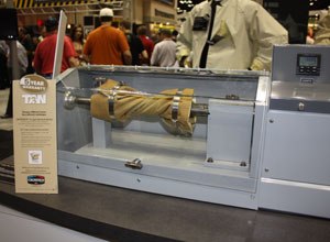 Photo Scott BrunerW.L. Gore's Crosstech Moisture Barrier is put through its paces on a Gelbo tester. The barrier is tested by flexing it and twisting the fabric to see how the knees and elbows hold up. It tests these garments for 3,000 cycles.