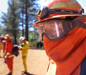 Inmate firefighters take part in the tool-out exercise.