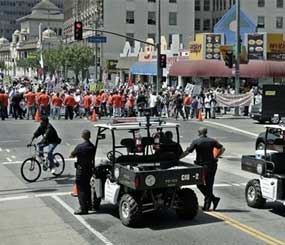 In this Thursday, May 1, 2008 file photo, Los Angeles Police Officers stand near
