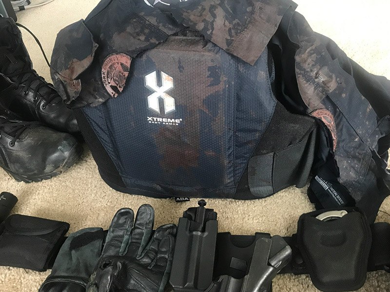 Pictured is the blood-soaked gear of Michael Lutz.