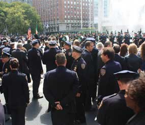 The pipes and drums of the NYPD Emerald Society perform after the ceremony held Thursday, September 8, 2011 at the palatial Avery Fisher Hall of the world-famous Lincoln Center.