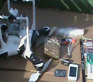 The drone used and contraband items found. (Oaklahoma Department of Corrections Image)