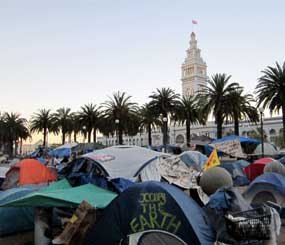 The ‘Occupy’ movement encampment at Justin Herman Plaza in San Francisco is small and contained across the Embarcadero from the historic Ferry Building but it is also messy and chaotic — a potentially problematic place for first responders to provide law enforcement and life saving services.