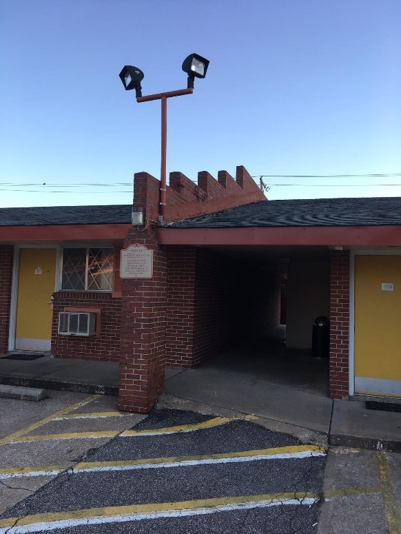 Parapeted fire wall.