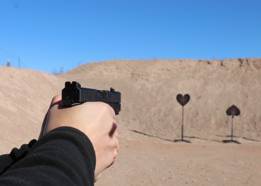 Shooting the Type B: Notice how the web of the hand is nearly at the level of the bottom of the slide. The rapid fire accuracy was encouraging.