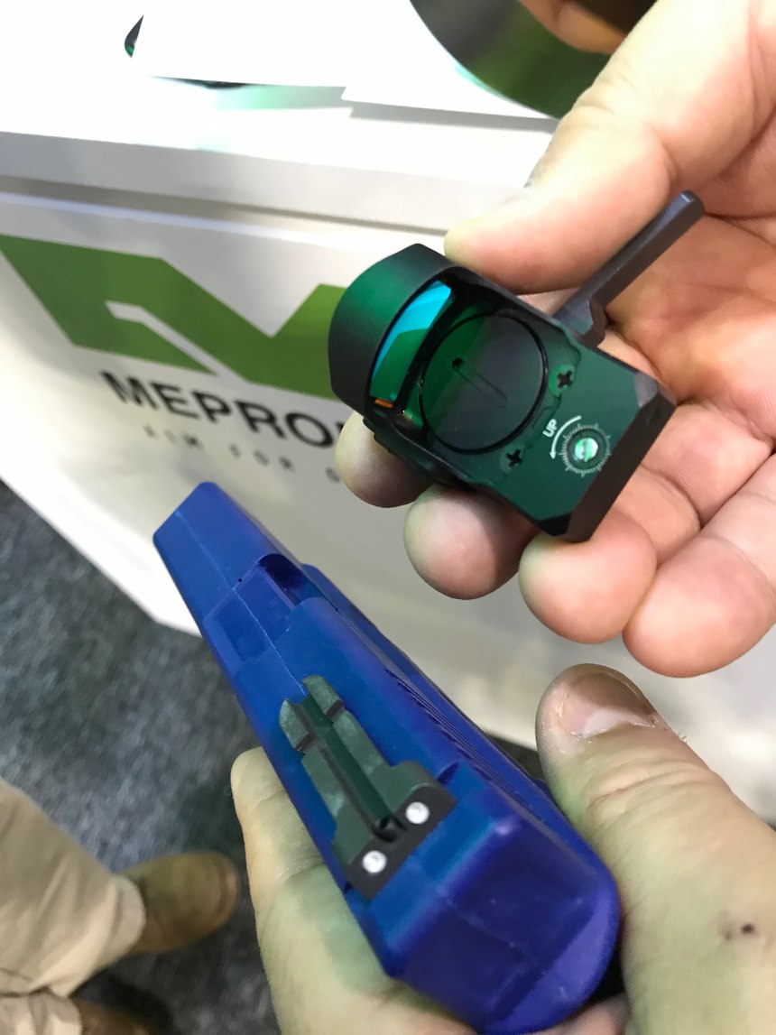 Meprolight MEPRO MicroRDS with Backup Night Sights uses the rear sight as the rail for the MicroRDS reflex part. The good thing about this setup is it does not require a RMR cut in the slide. It uses the standard rear sight dovetail.
