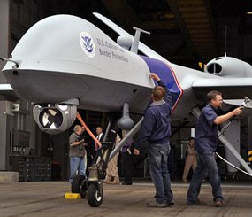 The Predator B aircraft (shown above) has a 64-foot wingspan, can stay aloft for up to 18 hours at a typical operational altitude of 19,000 feet, is packed with high-tech surveillance equipment including synthetic-aperture radar and electro-optical/infrared sensors, and can capture high-definition and infrared video of anything within a 25-mile radius of its position.