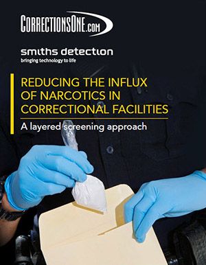 Reducing the influx of narcotics in correctional facilities, a layered screening approach (uniformed officer with gloves on places a baggie of white powder in an evidence folder)