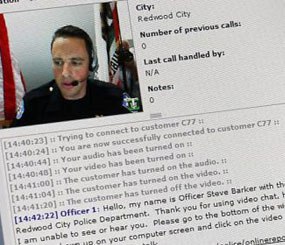 The Redwood City pilot program requires a person to click on a button on the PD’s website. Up pops the face of an officer sitting in front of two computers ready to answer a question. The user of the service is not required to have his or her computer camera on, the chats are not recorded, and the police can’t trace the user. (PoliceOne Image)